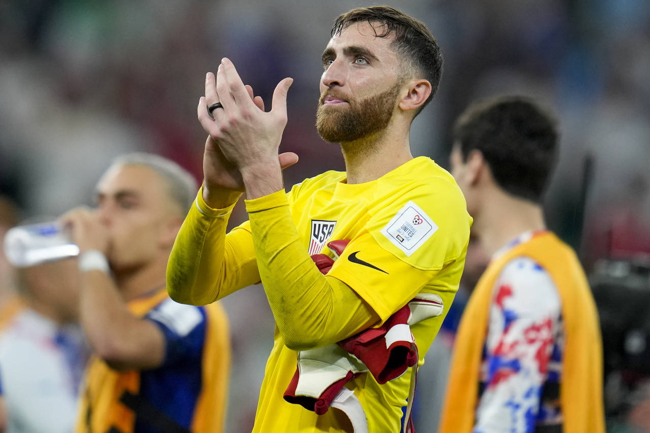 goalkeeper Matt Turner of the United States celebrates after the World Cup group B soccer match bet...