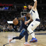 Doncic, Mavericks rebound to beat Timberwolves for split