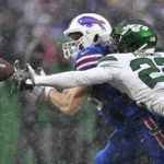 AFC-leading Bills overcome elements, beat White, Jets 20-12