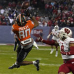 Wisconsin beats Oklahoma State 24-17 in Guaranteed Rate Bowl