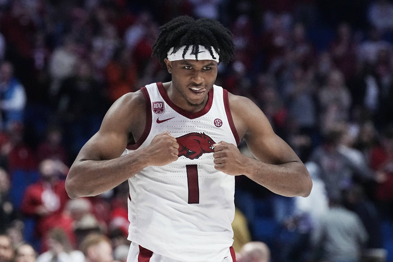 Arkansas guard Ricky Council IV (1) celebrates after Arkansas defeated Oklahoma in an NCAA college ...