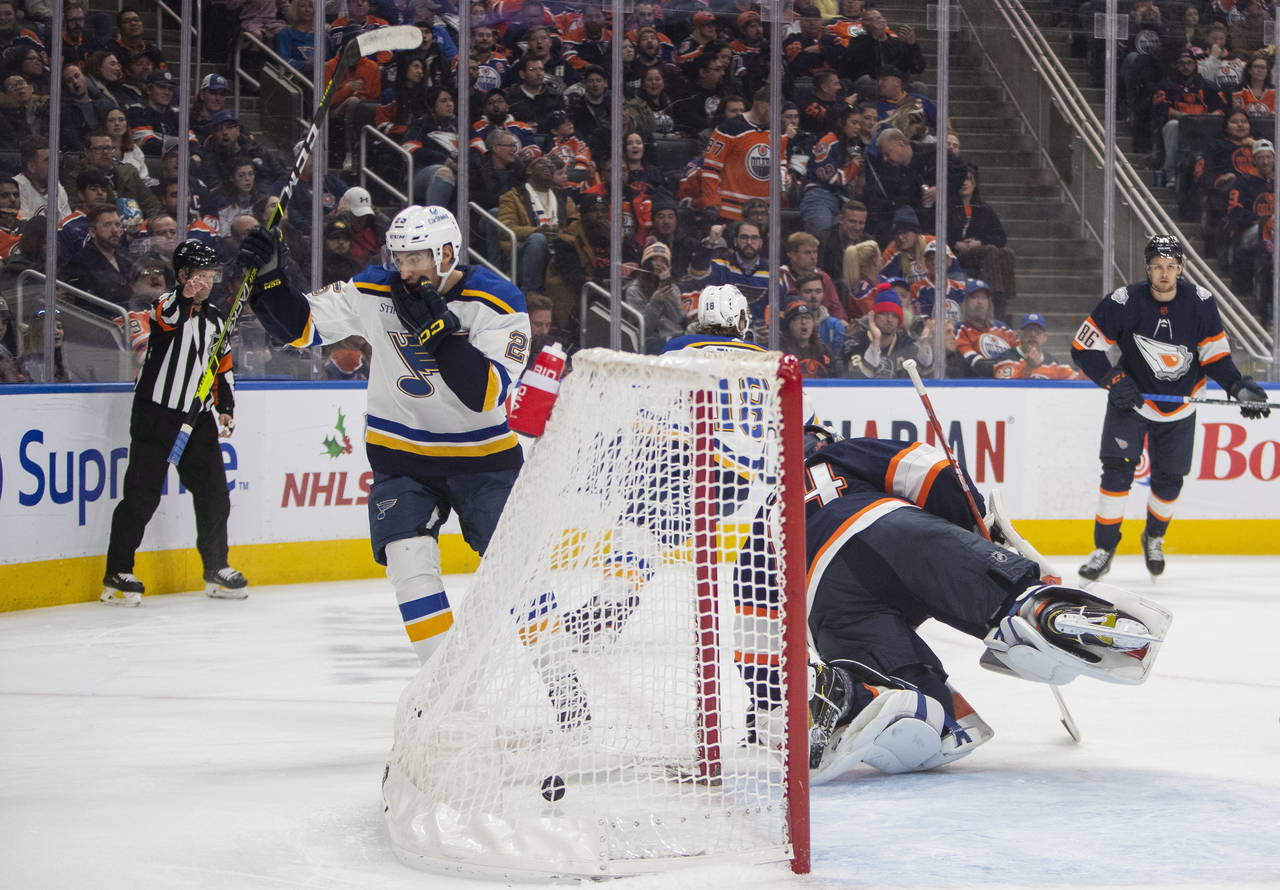 St. Louis Blues' Jordan Kyrou (25) celebrates a goal on Edmonton Oilers goalie Stuart Skinner (74) ...