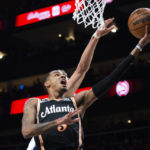 Murray hits winning free throws, Hawks end Magic's streak