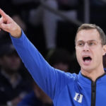 Roach leads No. 15 Duke past Iowa 74-62 in Jimmy V Classic