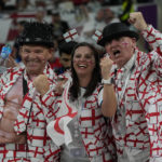 At World Cup, women fans shrug off worries over dress codes