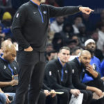 Cavaliers beat Mavericks 100-99 in OT on Allen's slam