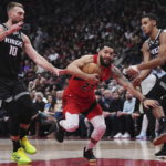 Fox has 27 points and 10 assists, Kings beat Raptors 124-123
