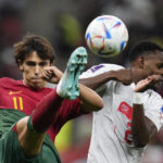 AP PHOTOS: World Cup highlights from Day 17
