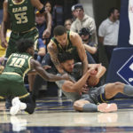 Johnson scores 17 to help West Virginia beat UAB 71-60