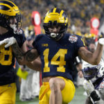 No. 3 TCU upsets No. 2 Michigan 51-45 in wild CFP semifinal