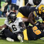 Hartman throws 3 TD passes, Wake Forest beats Missouri 27-17