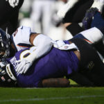 Lamar Jackson leaves game with knee injury after sack