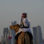 AP PHOTOS: Camels a common sight for World Cup visitors
