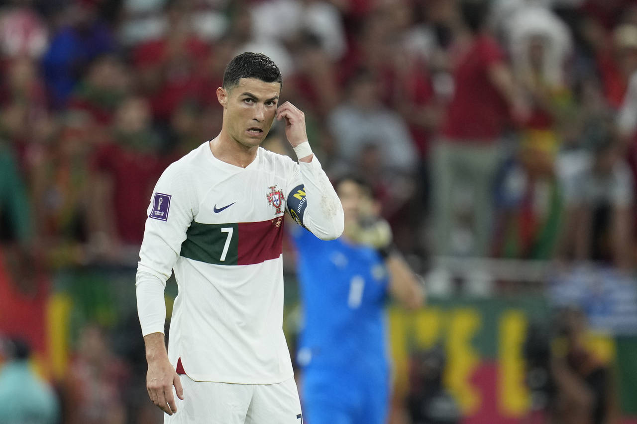 Portugal's Cristiano Ronaldo walks on the pitch during the World Cup quarterfinal soccer match betw...