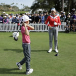 Woods and son hobble to a 59 and are 2 back of Team Thomas