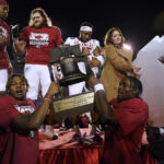Kansas rallies, but Arkansas wins Liberty Bowl 55-53 in 3OTs