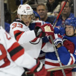 Rangers win 4-3 in OT to end Devils' 11-game road win streak