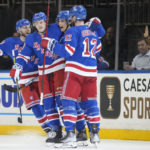 Rangers score 3 in third period to rally past Blues 6-4