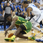 No. 21 UCLA rallies late, hangs on to beat Oregon 65-56