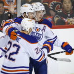 Oilers cash in on late power play to burn Flames 2-1