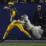 No. 3 TCU upsets No. 2 Michigan 51-45 in wild CFP semifinal