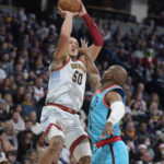 Jokic, Nuggets outlast Suns 128-125 in OT; Booker sidelined