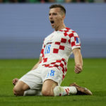 AP PHOTOS: World Cup highlights from Day 23