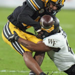 Hartman throws 3 TD passes, Wake Forest beats Missouri 27-17