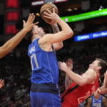 Doncic scores 39, Mavs rally for 111-106 over Houston