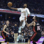 Jimmy Butler scores 23 as Heat hold off Cavaliers 100-97