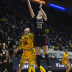 Brink's big day helps No. 2 Stanford hold off Cal 60-56