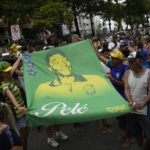 Pelé buried at cemetery in Brazilian city he made famous