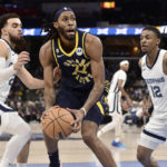 Grizzlies use Morant's triple-double, rally to beat Pacers