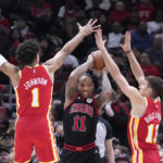 DeRozan scores 26 in 1,000th game, Bulls beat Hawks 111-100