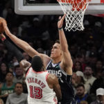 Doncic scores 34, Mavs get defensive in 115-90 win over Heat