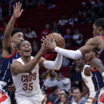 Garland scores 26 as Cavaliers race past Rockets 113-95