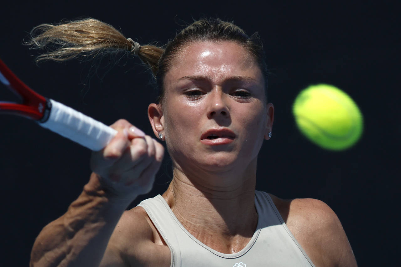 Camila Giorgi of Italy plays a forehand return to Anastasia Pavlyuchenkova of Russia during their f...