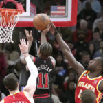 DeRozan scores 26 in 1,000th game, Bulls beat Hawks 111-100
