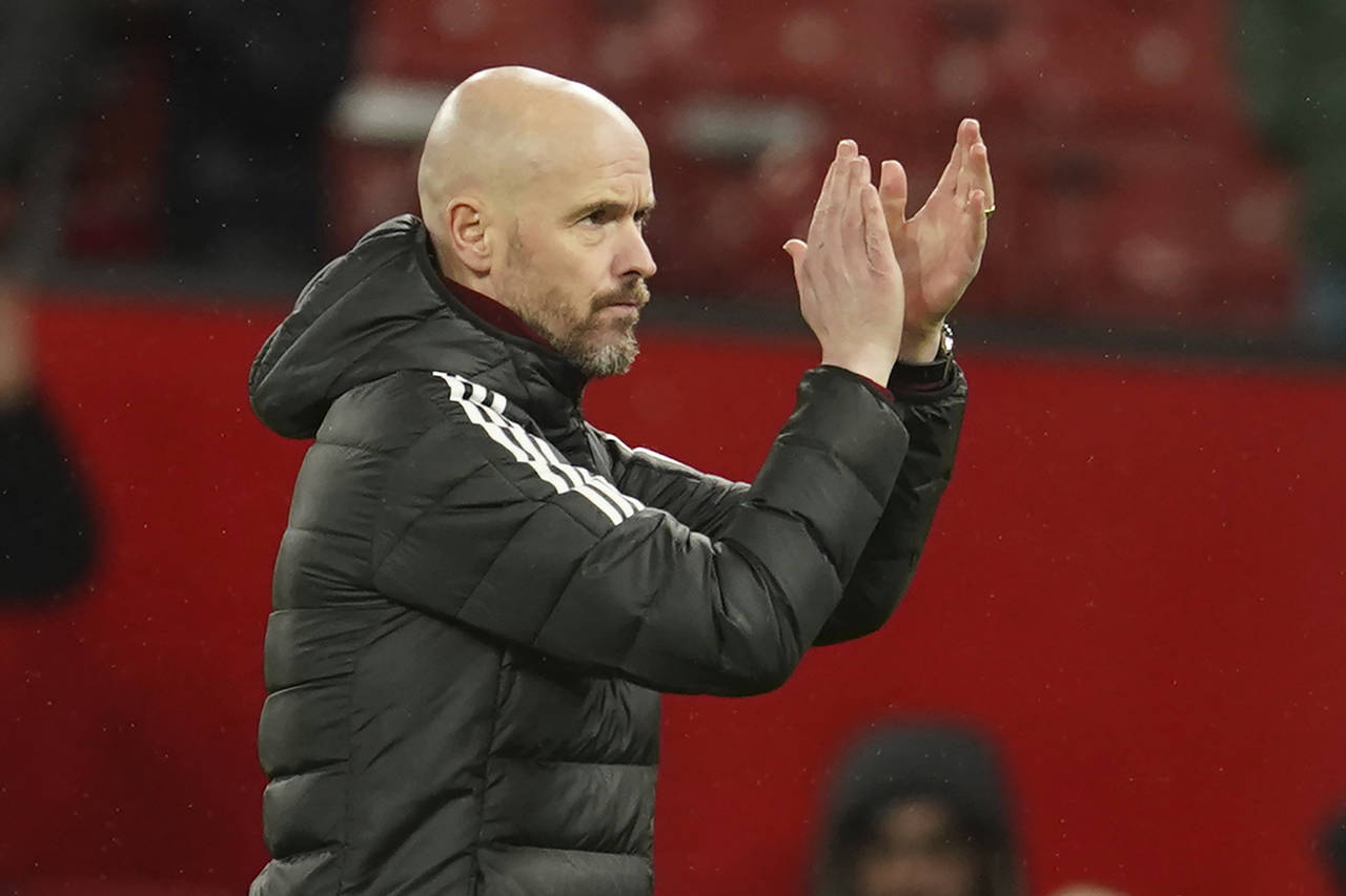 Manchester United's head coach Erik ten Hag celebrates after the English League Cup quarter final s...