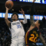 Young, Hawks beat Doncic, Mavs 130-122 for 4th straight win