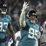 Jags return fumble for TD, beat Titans for AFC South title