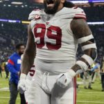 Giants outlast Vikings 31-24 for 1st playoff win in 11 years