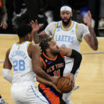 James has triple-double, leads Lakers past Knicks in OT