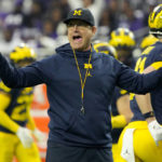 AP source: Panthers owner talks to Harbaugh about HC job