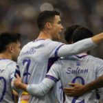 Bruised Ronaldo scores twice to edge showdown with Messi