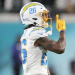 Jags QB Lawrence makes playoff history with 4 1st-half picks