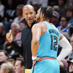 Garland, Mitchell lead Cavs past banged-up Suns 112-98