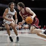 No. 18 Charleston wins 20 straight, beats Northeastern 87-61