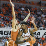 Carr, tough defense lead No. 6 Texas past Oklahoma St. 56-46