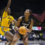 Brink's big day helps No. 2 Stanford hold off Cal 60-56